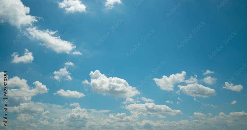 Wall mural cloud blue sky background time lapse beautiful white clouds approach the point of view backed by a v