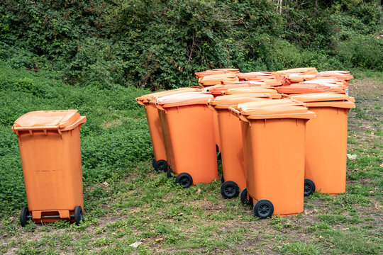 forgotten orange mill buckets in the landscape