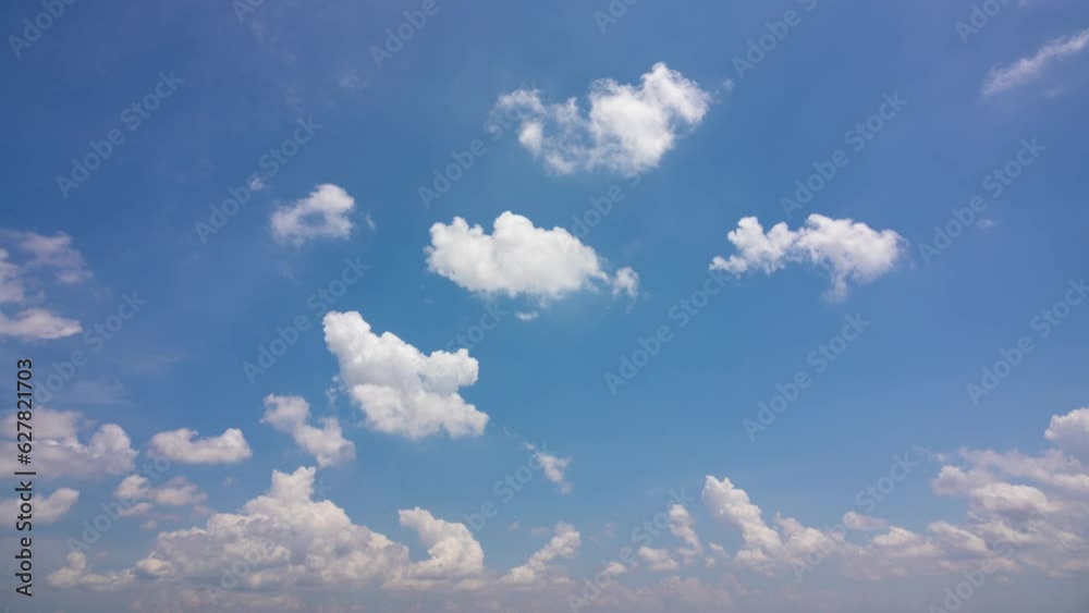 Wall mural cloud blue sky background time lapse beautiful white clouds approach the point of view backed by a v