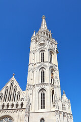 Fototapeta na wymiar Belfry of Church of St. Matthias in Fishing bastion in Budapest, Hungary