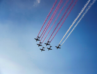 Airplanes in formation performing a colorful show at Lusail City, Doha, Qatar