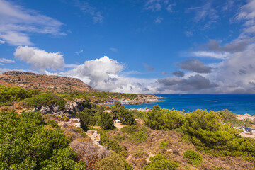 Gorgeous  landscape view of island on blue sea water merging with cloudless sky on background....