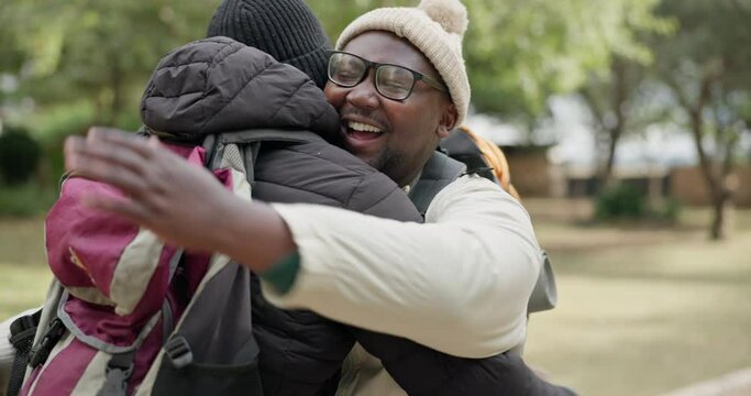 Camping, friends and hug greeting outdoor with travel and journey in nature with talking. Discussion, happy welcome and people on vacation and holiday adventure with conversation on journey for hike