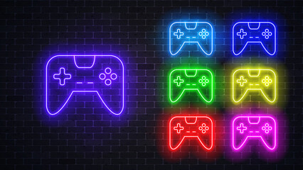 Gamepad neon glowing sign set. Vector illustration  © manabanana