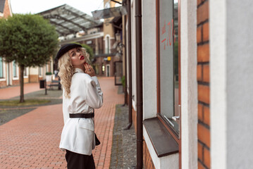 Autumn with a blonde in the old town