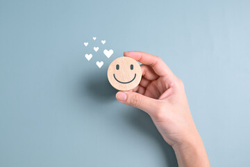 Hand with happy smile face emotion on background, Customer service evaluation, Positive thinking...