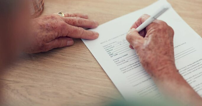Hands, sign or woman with contract, application or document for will, life insurance or divorce papers. Zoom, closeup or person writing signature for paperwork, form or title deed agreement on table