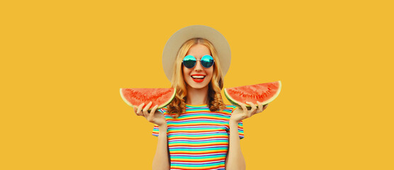 Summer portrait of happy smiling young woman with fresh juicy slice of watermelon wearing straw hat...