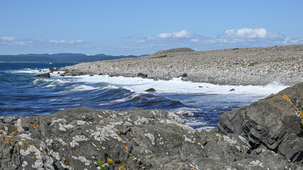 The wind always blows at this headland in Vestfold, the waves white and frothy as they crash onto the shore.
