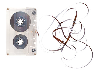 Cassette tape with the tape pulled out on an isolated background.