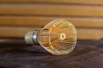 Close-up of bamboo whisk for frothing green tea.