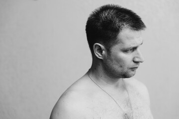 A man holds a banana in his hand. Potency problems. guys health