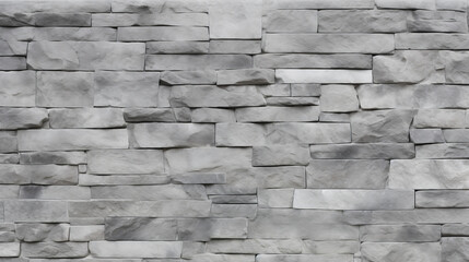 A textured gray stone wall