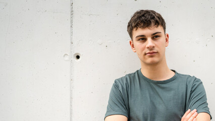 portrait of young Caucasian man teenager 18 or 19 years old outdoor