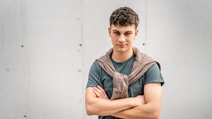 portrait of young Caucasian man teenager 18 or 19 years old outdoor