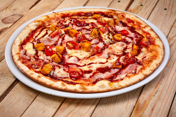 pizza on the wooden background