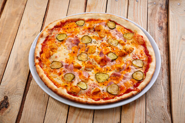 pizza on the wooden background