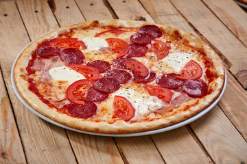 pizza on the wooden background