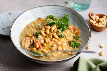 Chicken in curry sauce served in bowl