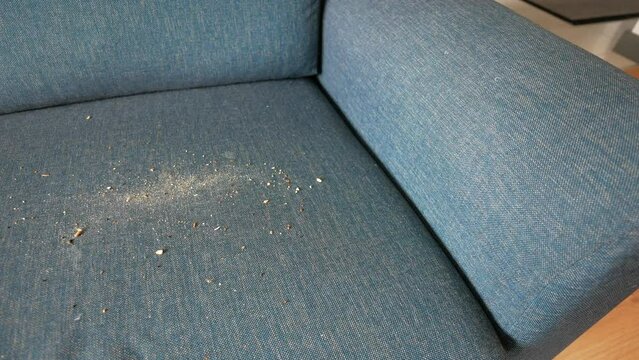 dirty stain or dust on gray color sofa 