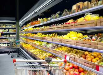 buying fruits(apples and pears)  at the market