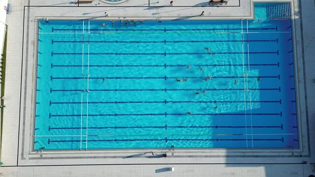 Aerial Birds Eye View of Water Polo Match in 4K. Concept of Summer Olympic Games, Olympics, Paris 2024