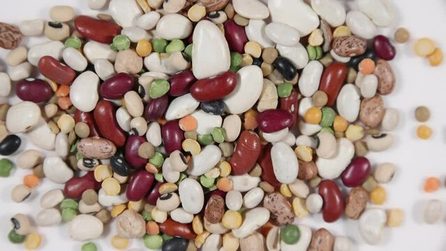  Beans and lentil uncooked soup mix spinning clockwise - shallow depth of field.
