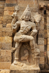 Fototapeta na wymiar Stone statue of guardian Hindu deity