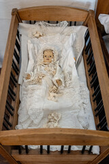 Cradle for a small child with a doll.