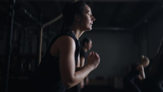 Adult Brunette Woman Doing Squats For Beauty Of Buttocks And Legs In Fitness, Group Class For Women