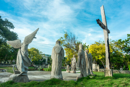 Religious statues standing outside the entrance to Oslob Church,Cebu,Philippines.