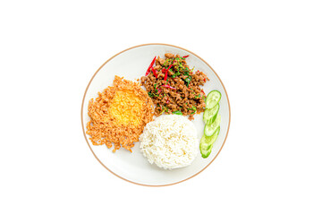 Rice, stir-fried minced pork with basil leaves and fried egg in a plate Thai street food