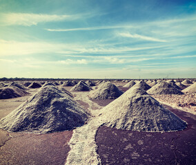 Vintage retro hipster style travel image of salt mine at Sambhar Lake, Sambhar, Rajasthan, India