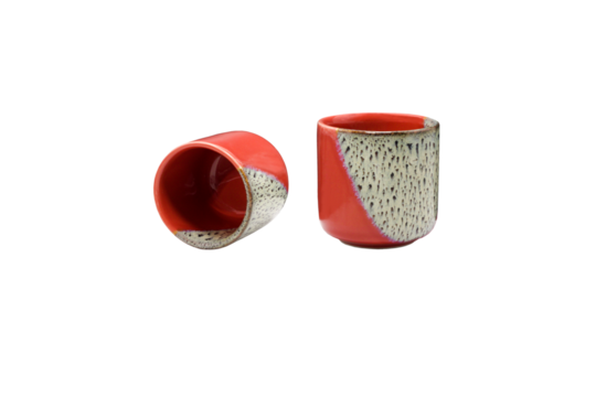 Closeup view of ceramic cup with traditional art pattern isolated on png file at transparent background