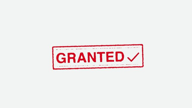 Real Hand Stamping Granted Stamp on White Background