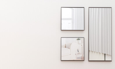 Mockup poster frame with the mirror reflection of a small living room in the background. Background for display of interior decoration products with copy space. 3d rendering