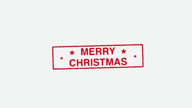 Real Hand Stamping Merry Christmas Stamp on White Background