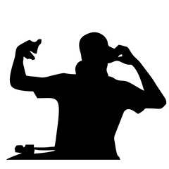 silhouette of a DJ