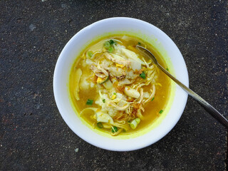 Delicious porridge gravy. Porridge or chicken porridge in Indonesian native called bubur ayam is a popular breakfast menu