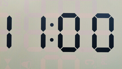 Close-up Front view Digital LCD clock shows 11:00, Time concept.