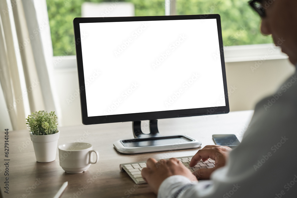Poster man working businessman using a desktop computer of the blank screen copyspace