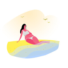 young pregnant woman relaxing on the beach with her feet in the water.Health and fitness for pregnant women.