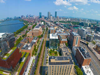 Boston Back Bay modern city skyline including John Hancock Tower, Prudential Tower, and Four Season Hotel at One Dalton Street from Fenway on Commonwealth Avenue in Boston, Massachusetts MA, USA.  