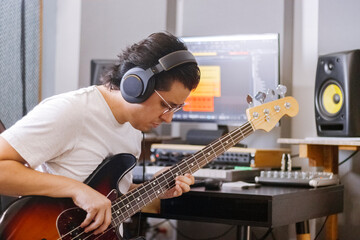Bass Player, Home Studio Recording, Music Production, Bassist, Headphones. - obrazy, fototapety, plakaty