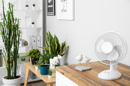 Modern Electric Fan On Table In Living Room