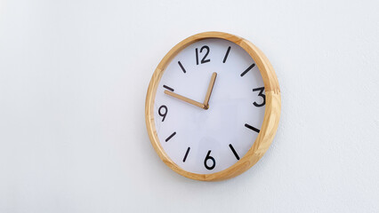 Modern wooden round clock on white wall background, Flat timer watch simple design decorate in office