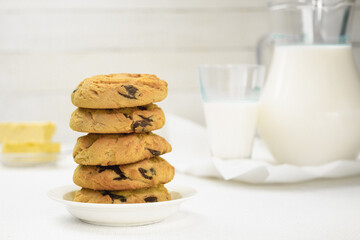 Homemade chocolate chip cookies, Cookies and a jug of milk