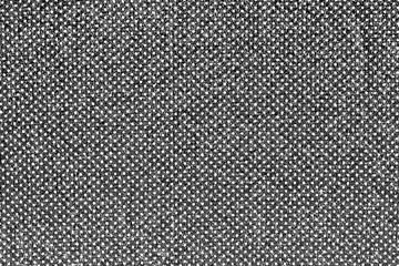 The grunge texture of a black-and-white image with randomly scattered dots. Abstract monochrome simple background. Vector illustration. Overlay template.