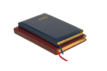Pile of blue and dark red notebook on isolated white
