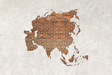 Asia map on antique brick wall texture background.